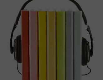 Row of coloured books with headphones